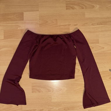 burgundy top with wide sleeves