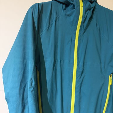 Turquoise rain jacket