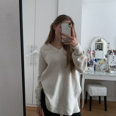 Maglione con scollo a V bianco