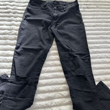 Black jeans with holes