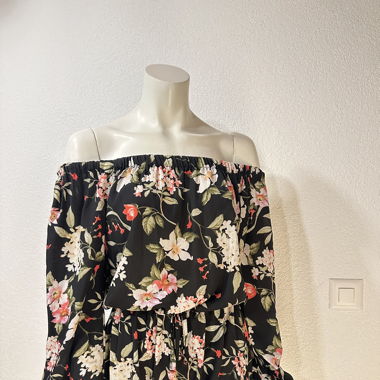 Schulterfreier Blumen-Jumpsuit in Schwarz