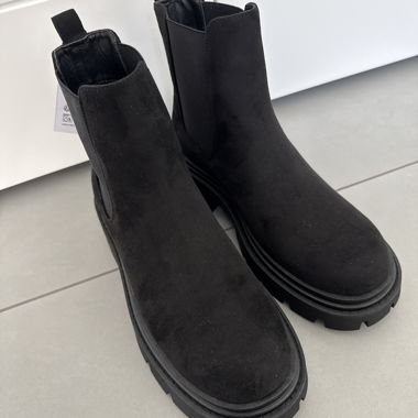 Schwarze Chelsea Boots