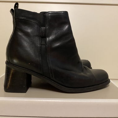 Black leather heeled ankle boots