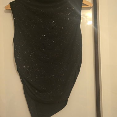 Glitzerndes schwarzes Top