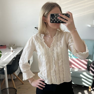Blusa bianca da donna con pizzo
