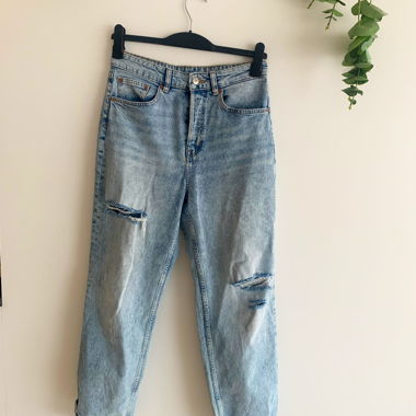 Light blue straight jeans with rips