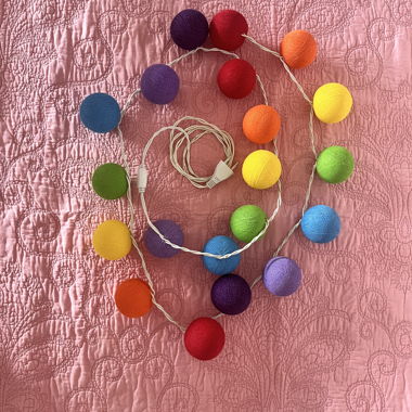 Colorful string lights with cotton balls