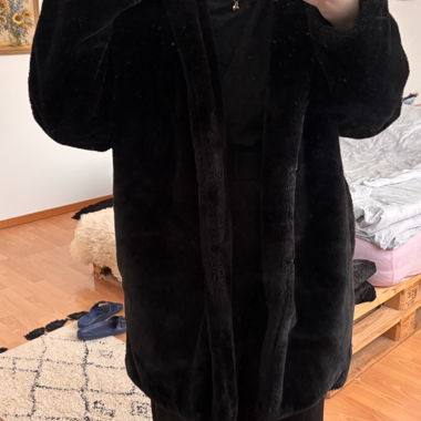Black faux fur hooded coat