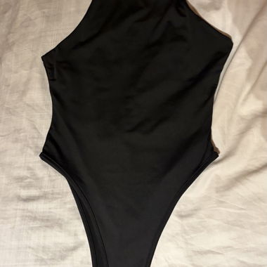 Black bodysuit with high leg cut
