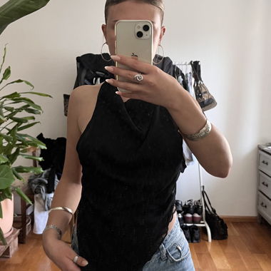 top scollato