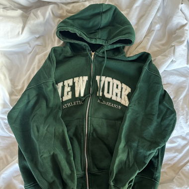 Felpa con zip verde New York