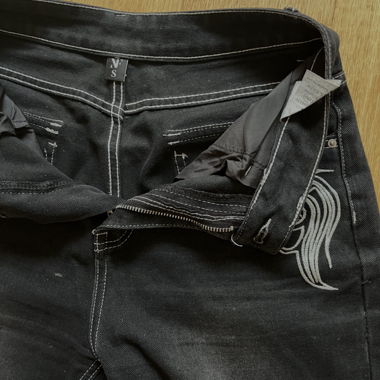 Streetwear style black baggy jeans with print