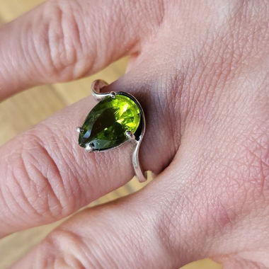 Silver ring with green stone