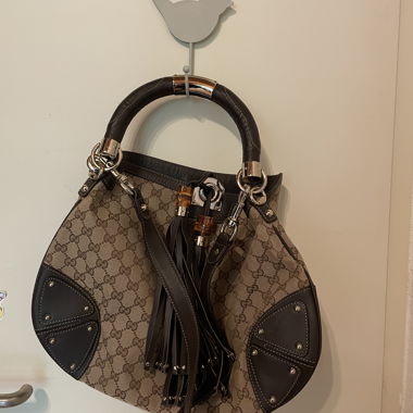 Borsa a mano Gucci con monogramma e manici