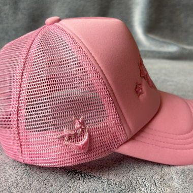 Pink cap with star branding side art 