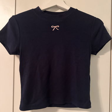 Dark blue shirt with pink bow