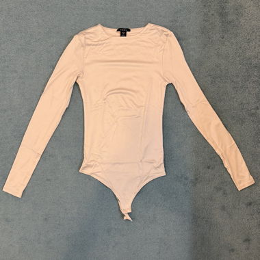Beige long-sleeve bodysuit from New Yorker