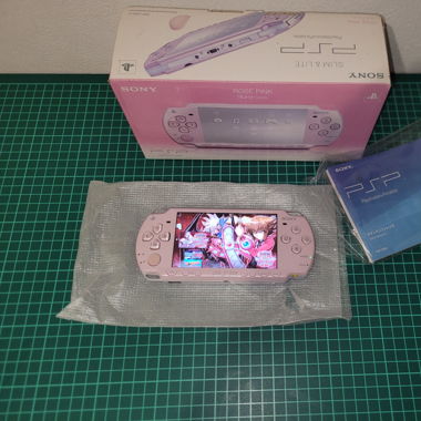 PSP in box with games installed [ in OVP]