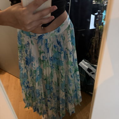 Jupe plissée à fleurs