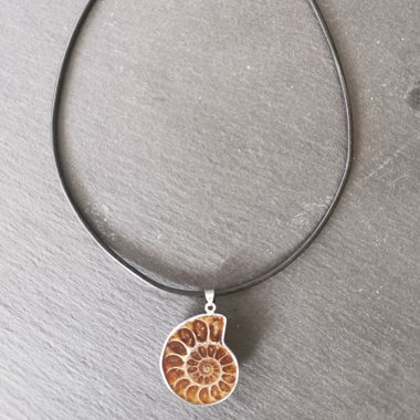Ammonite in 925 silver setting with leather necklace