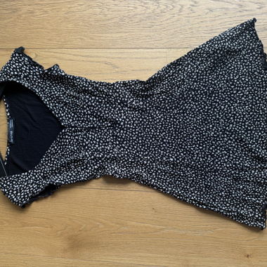 Short black dress with white flowers