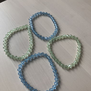 Bracelets with translucent green and blue beads
