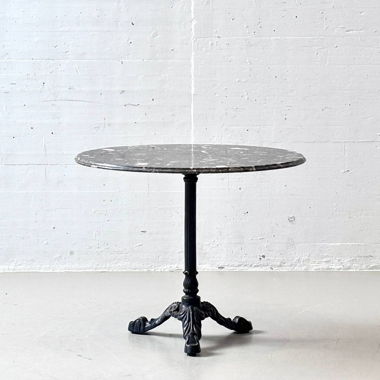 Elegant dark bistro table with marble top