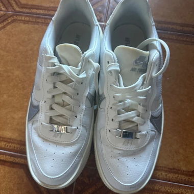 Sneakers bianche in pelle