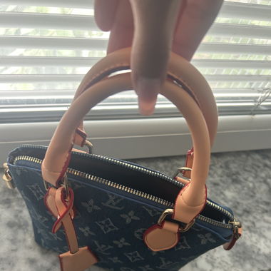 Lv Handtasche