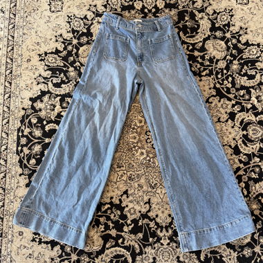 Jeans in denim a gamba larga
