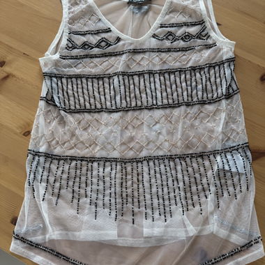 Top in maglia perlata