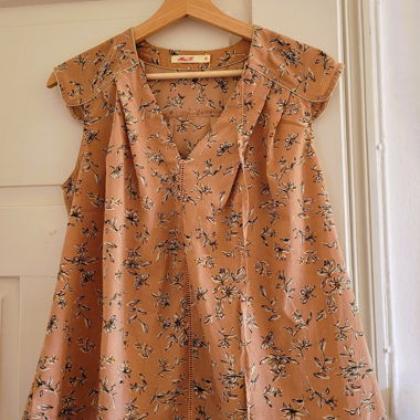 Blusa leggermente rosa