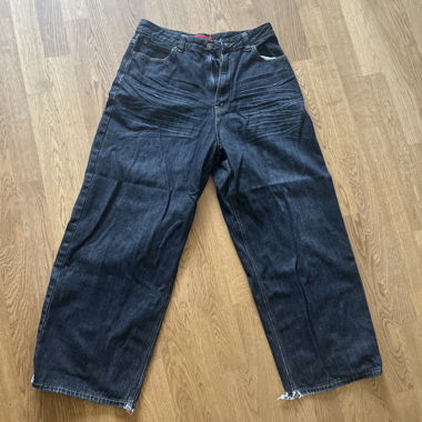 Dark jeans with wide leg