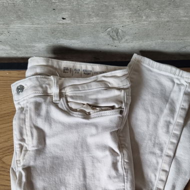 Cream colored trousers