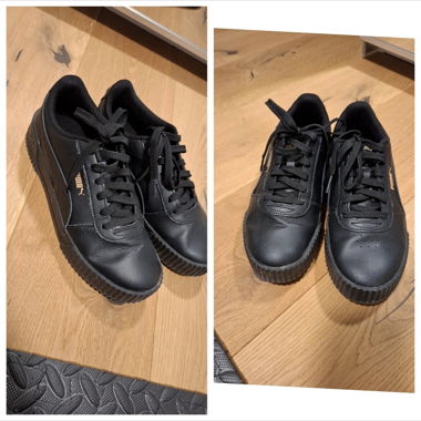 Schwarze Puma Sneakers Gr. 39