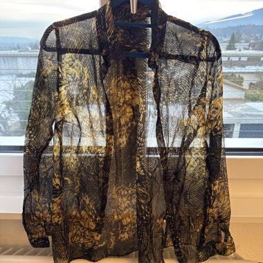 Blusa stampa serpente