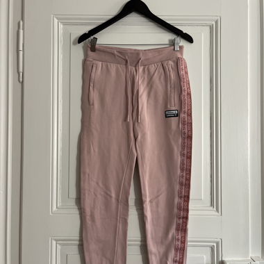 Pantaloni della tuta Adidas rosa, taglia 36