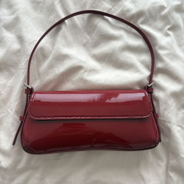 Red patent baguette bag