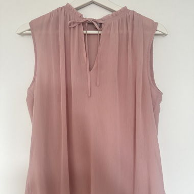 Blusa rosa senza maniche