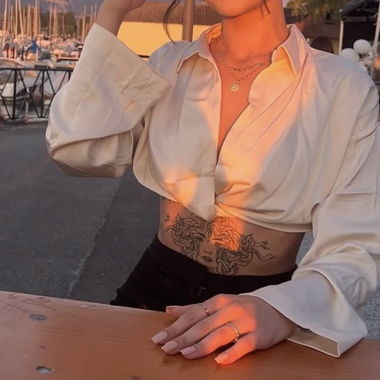 Top in raso elegante colore avorio