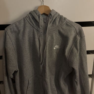 Giacca con cappuccio Nike grigia