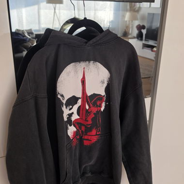 Black hoodie with skull print