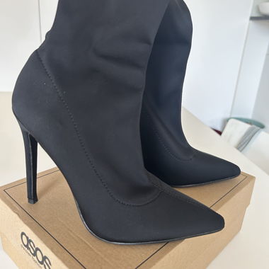 Black stiletto mid calf sock boots