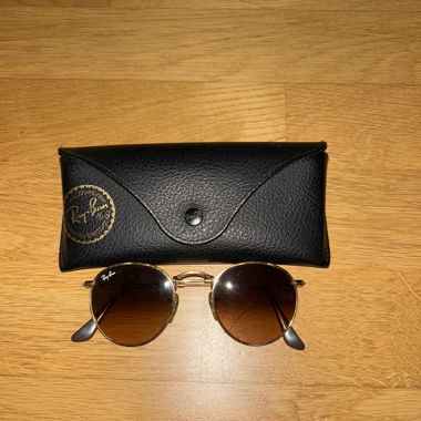 Lunettes de soleil rondes Ray-Ban avec étui