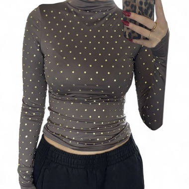 Top marrone a maniche lunghe con pois dorati