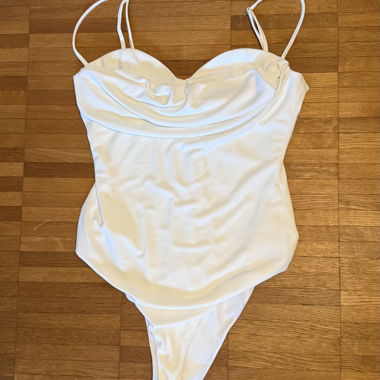 White draped bodysuit with spaghetti straps