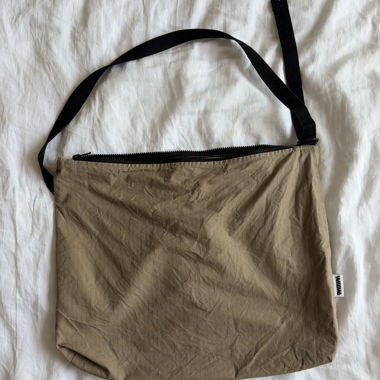Beige crossbody bag by wawwa clothing