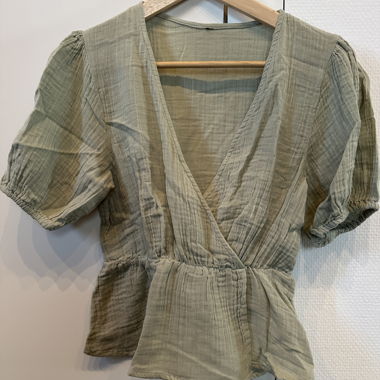 Blusa a portafoglio in mussola alla menta
