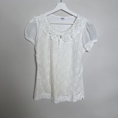 Chemisier blanc en dentelle