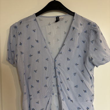 Blusa blu a righe con fiorellini, taglia 38